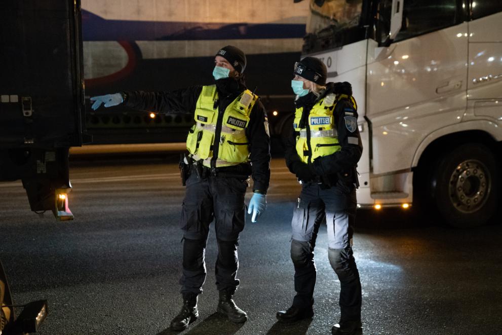 Police officers wearing face masks during the coronavirus pandemic in Tallinn